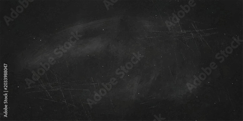 Foto A dusty blackboard surface showing faint chalk marks and scratches, perfect for a background element or a placeholder for text