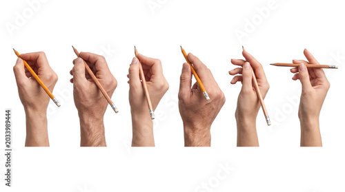 Tableau sur toile Various hands gripping wooden pencils, showcasing different writing and drawing postures