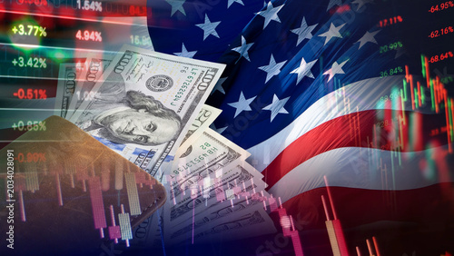 Photos United States financial market trends and economy data are represented by a wallet with US dollar banknotes and stock exchange candlestick charts, superimposed on the flag of the United States