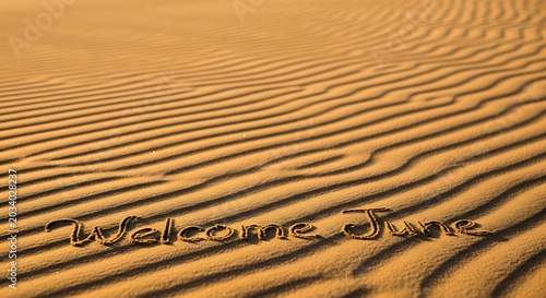Golden wheat field with welcome text overlay in serene landscape.