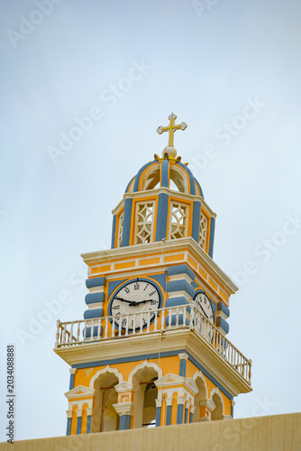 Tableau sur toile Clock tower of the Catholic Cathedral in Fira