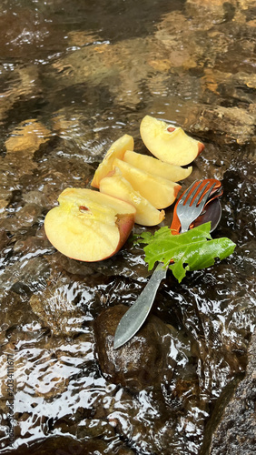 Fresh and healthy apples. Peeled in a clear mountain stream