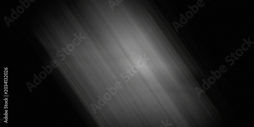 Abstract monochrome background with diagonal motion blur and soft white light center creating ethereal mysterious atmosphere.