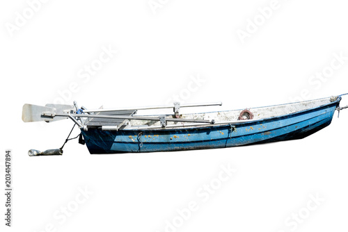 Foto Blue fishing boat resting on a flat surface under bright lighting in a simple ou