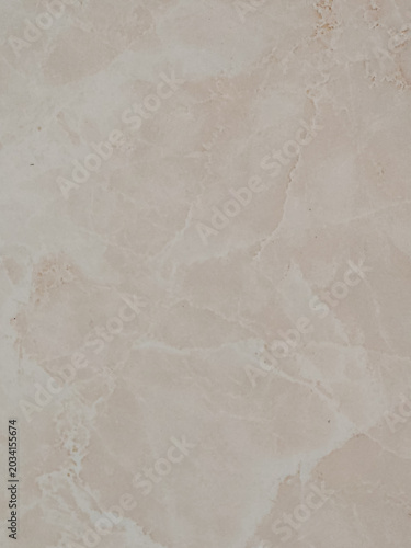 High resolution natural beige marble stone texture background with subtle organic veins and soft neutral tones