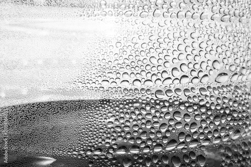 Фотография Abstract black and white macro of water condensation droplets