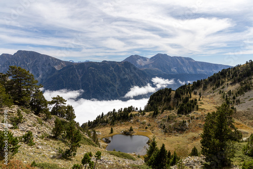 Mountain landscape with an alpine lake in the Belledonne Massif, French Alps, Isère