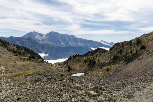 Mountain landscape with an alpine lake in the Belledonne Massif, French Alps, Isère
