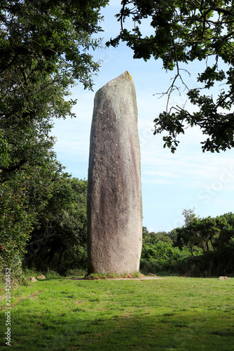 Menhir Kerloas is a famous ancient standing stone in Brittany, France.