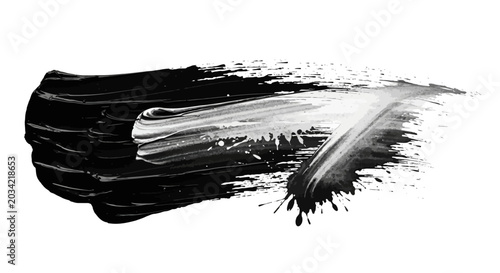 Foto Abstract black and white brush stroke with paint splatters