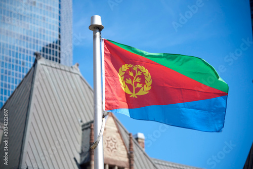 Photography The Eritrean flag on a flag pole at Toronto City Hall’s Nathan Phillips Square