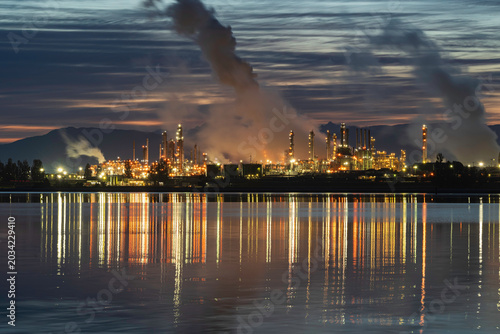 Sunrise over an oil refinery, Fidalgo Bay, Washington State.