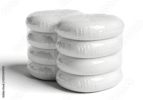 Stack of white inflatable pool floats isolated on white background