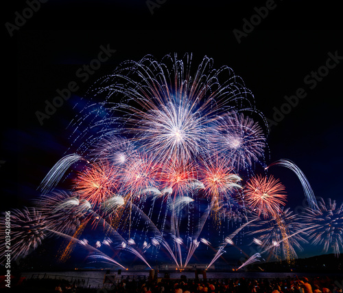 The crowd of Silhouette watching firework isolated display for celebration happy new year and merry christmas on black isolated background