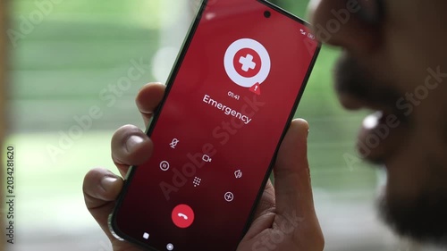 Man calling emergency number for crisis situation