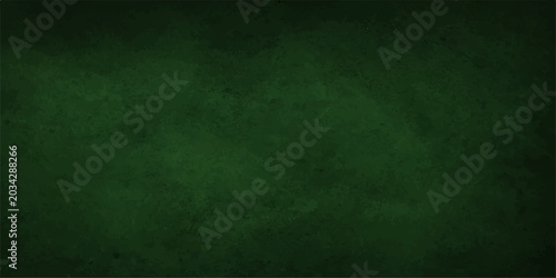 Green grunge textured vintage background with aged dirty paper style and rough canvas wallpaper design