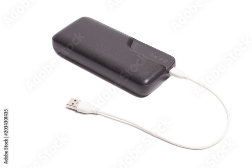 portable external battery for charging phone isolated on white background