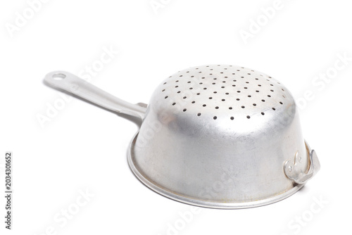Aluminum colander isolated on white. Cooking utensil.