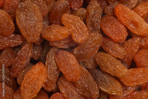 Dried fruits raisins background. Dried grapes