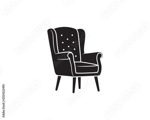 Black armchair with buttons on upholstery