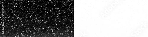 Obraz na płótnie Light snow falling vertically with small white particles creating peaceful winter scene for atmospheric design