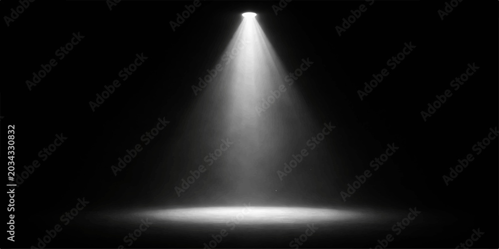 Obraz premium Dramatic single spotlight shining on dark stage floor with soft fog, creating moody atmosphere perfect for theatrical performances, concerts, and events