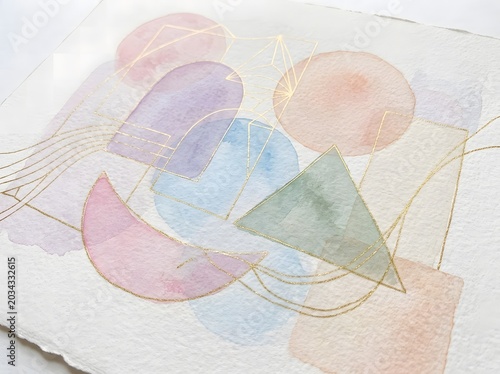 Geometric abstract art with pastel colors and gold lines on textured paper