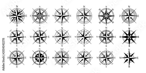 Compass rose icon vector set with nautical wind rose elements, cardinal directions, and black star grid patterns