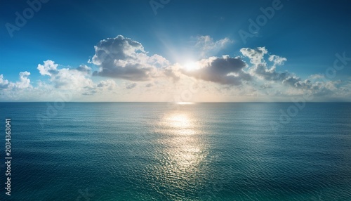 sunny ocean horizon wallpaper with glowing reflection and peaceful atmosphere high resolution picture