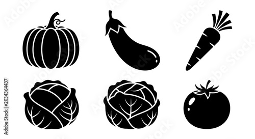 Black silhouettes of various vegetables on white background