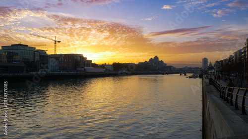 Canvas Print River Liffey in Dublin, Ireland at sunset, with the sky reflected on the water
