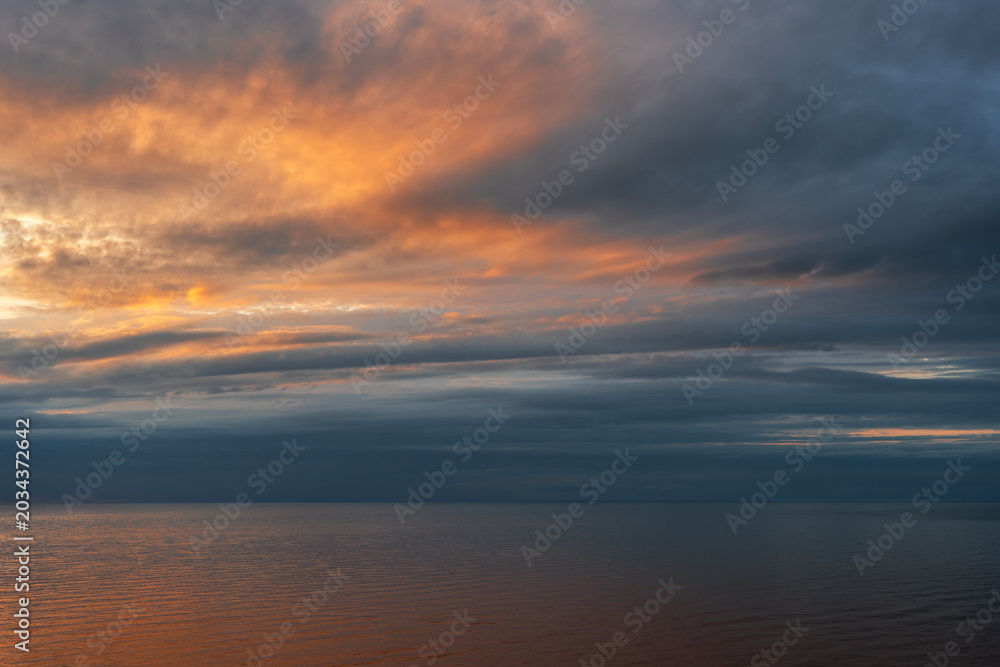 Fototapeta premium Bright sunset over the sea.