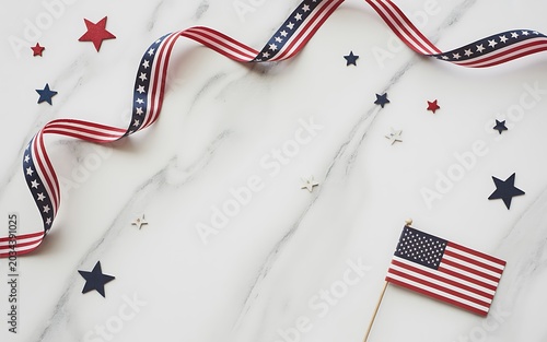 Patriotic 4th of july decorations with american flag and stars on marble background