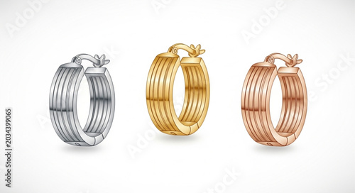 Tableau sur toile Three elegant rings in different precious metals on a white background