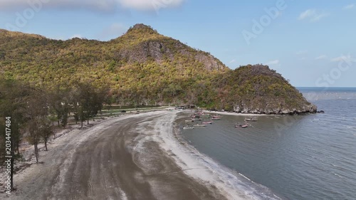 Aerial Drone View Of Sam Phraya Beach Thailand
Aerial drone footage of fishing boats near Sam Phraya Beach coastline in Thailand on 19 May 2026.
