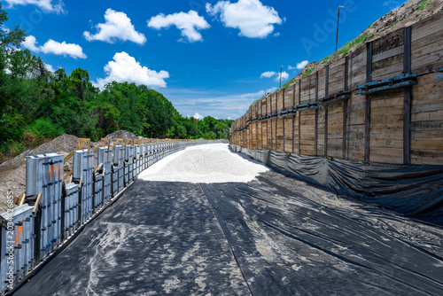 Bild auf Leinwand Perspective view of an active civil engineering construction site showing a newl