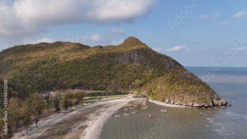 Aerial Drone View Of Sam Phraya Beach Thailand
Aerial drone footage of fishing boats near Sam Phraya Beach coastline in Thailand on 19 May 2026.
