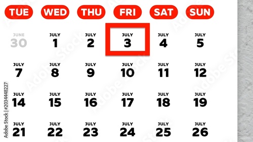 Close-up of July 3rd date marked with a red cursor on a 2026 wall calendar