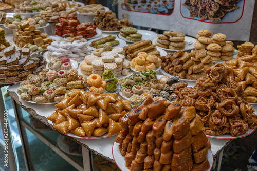 Selection of traditional Moroccan pastries and sweet cookies served on plates
