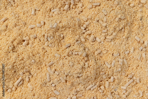 Foto pellets from pine sawdust after getting water, the wood pallets got wet and crumbled into sawdust, some of them did not get wet and retained their cylindrical shape