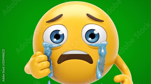 Crying emoji with tears of sadness on green background