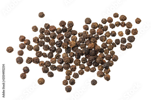 Black peppercorns or pepper isolated on a white background. Top view. Flat lay