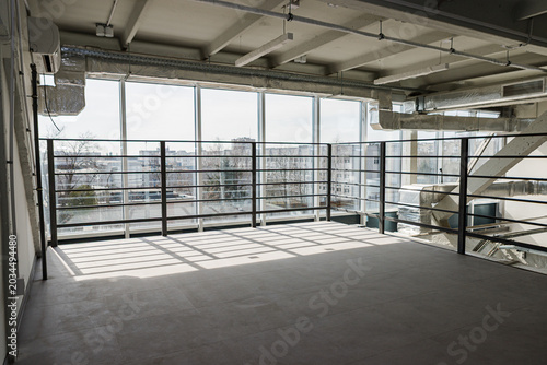 Spacious Industrial Loft Interior With Large Windows
