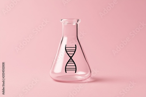 DNA Double Helix Icon Inside Glass Erlenmeyer Flask on Pink Background — Cosmetic Science Concept. The Concept of Using PDRN Salmon DNA in Cosmetics and Facial Care Procedures.
