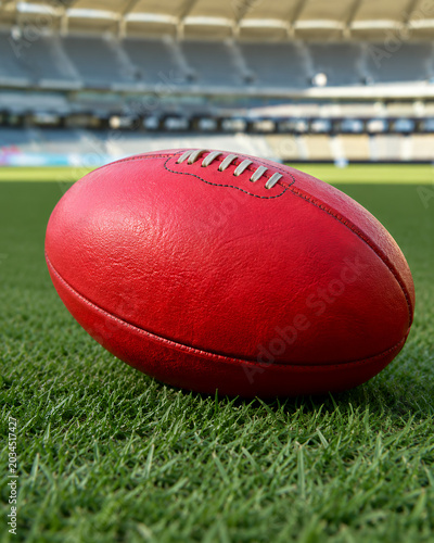 Australian Football Ball on Professional Stadium Grass