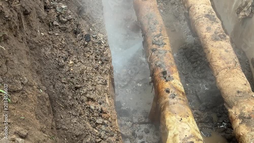 Emergency repair works on underground heating pipelines with accident elimination and utility maintenance process