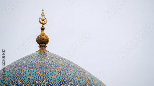 Detailed Close Up View of Patterned Mosque Dome with Gilded Finial