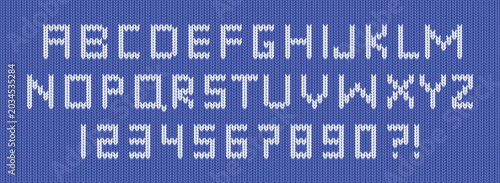 Christmas sweater font, alphabet and numbers with knitting pattern. Blue wool jumper texture with white type. Woolen knitwear background with font for warm winter ugly sweater, vector illustration