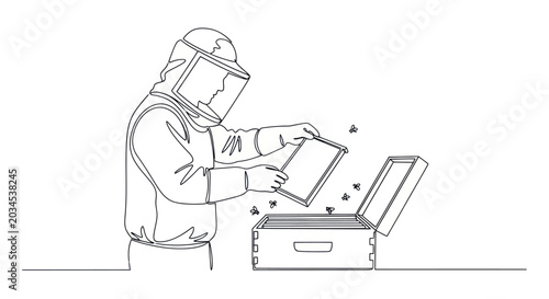 Photos Beekeeper in protective suit inspecting a beehive with frames and bees