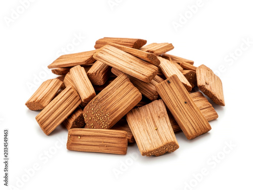Natural aromatic mesquite wood chips for barbecue smoking flavor isolated on white background for grilling tools